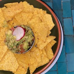 Tortilla chips with guacamole